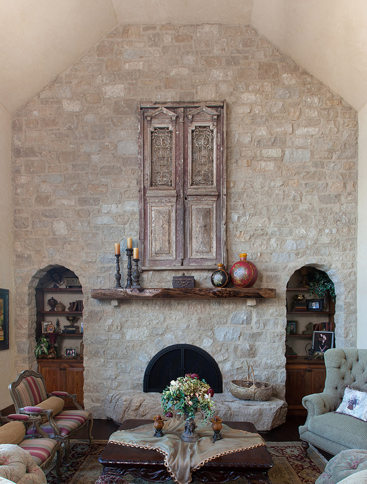 Fireplaces of EW Gold carry the exterior feel into the living space.